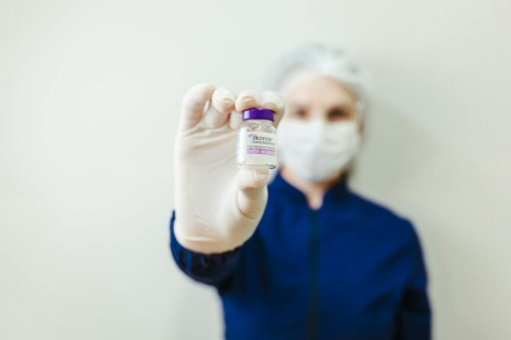 Woman Holding Botox Flask