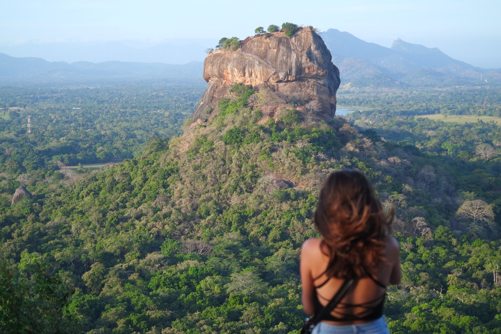 Girl,In,Front,Of,Lion's,Rock,,Sigiriya,,On,Pidurangala,Rock