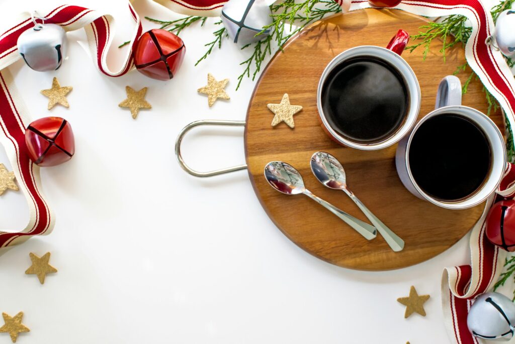 stainless steel fork beside white ceramic mug on brown wooden round plate